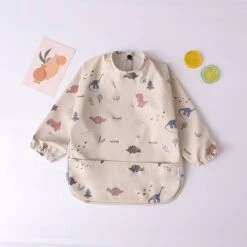 Mon Avenir - Longsleeve Slab - Waterproof - Schort Lange Mouwen - Beige - Dino -Winkel Voor Babyproducten 1200x1200 688